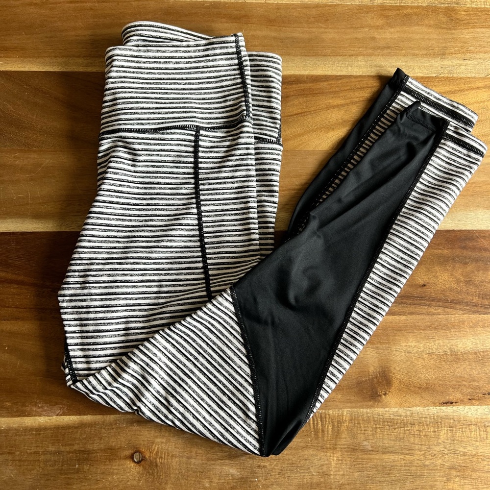 Carly Jean black and white stripped leggings- L